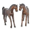 A PAIR OF BRONZE HORSES