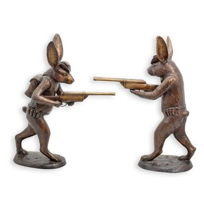 A PAIR OF BRONZE HUNTING HARES