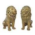 A PAIR OF BRONZE LIONS SITTING