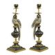 A PAIR OF BRONZE MOUNTED PORCELAIN PARROT CANDLE HOLDERS