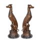 A PAIR OF BRONZE SITTING WHIPPETS