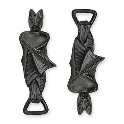 A PAIR OF CAST IRON BAT BOTTLE OPENERS