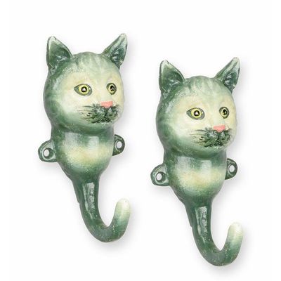 A PAIR OF CAST IRON CAT COAT HOOKS