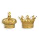 A PAIR OF CAST IRON CROWNS