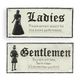 A PAIR OF CAST IRON GENTLEMEN AND LADIES" TOILET SIGNS"