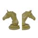 A PAIR OF CAST IRON HORSE HEAD BOOKENDS