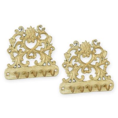 A PAIR OF CAST IRON KEY-HOLDERS