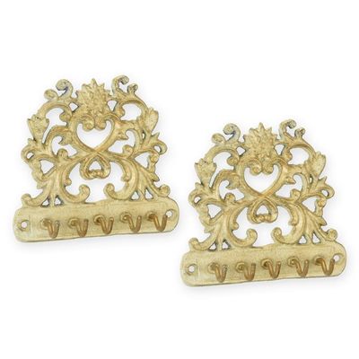 A PAIR OF CAST IRON KEY-HOLDERS