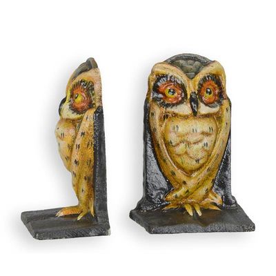 A PAIR OF CAST IRON OWL BOOK ENDS