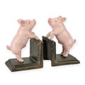 A PAIR OF CAST IRON PIG BOOKENDS