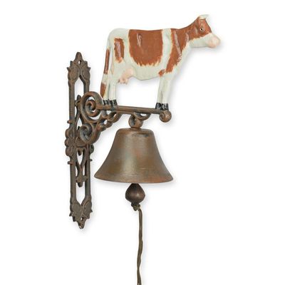 A PAIR OF CAST IRON RED SPOTTED COW BELLS