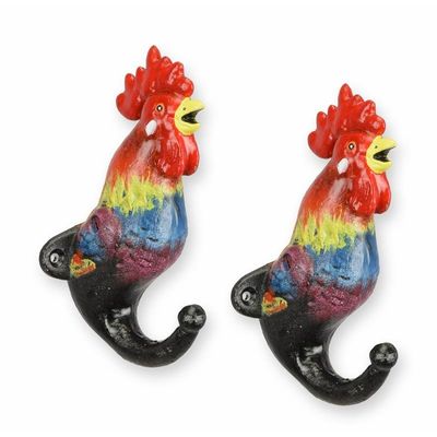 A PAIR OF CAST IRON ROOSTER COAT HOOKS