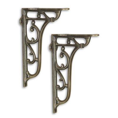 A PAIR OF CAST IRON WALL BRACKETS - BRASS FINISH