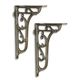 A PAIR OF CAST IRON WALL BRACKETS - BRASS FINISH
