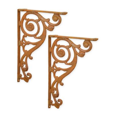 A PAIR OF CAST IRON WALL BRACKETS