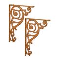 A PAIR OF CAST IRON WALL BRACKETS