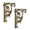 A PAIR OF CAST IRON WALL BRACKETS