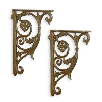 A PAIR OF CAST IRON WALL BRACKETS