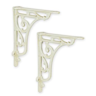 A PAIR OF CAST IRON WALL BRACKETS