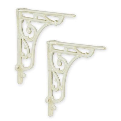 A PAIR OF CAST IRON WALL BRACKETS