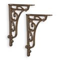 A PAIR OF CAST IRON WALL BRACKETS