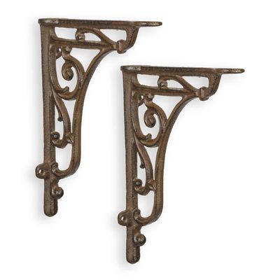 A PAIR OF CAST IRON WALL BRACKETS