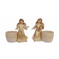 A PAIR OF FIGURAL PORCELAIN TEA LIGHT HOLDERS