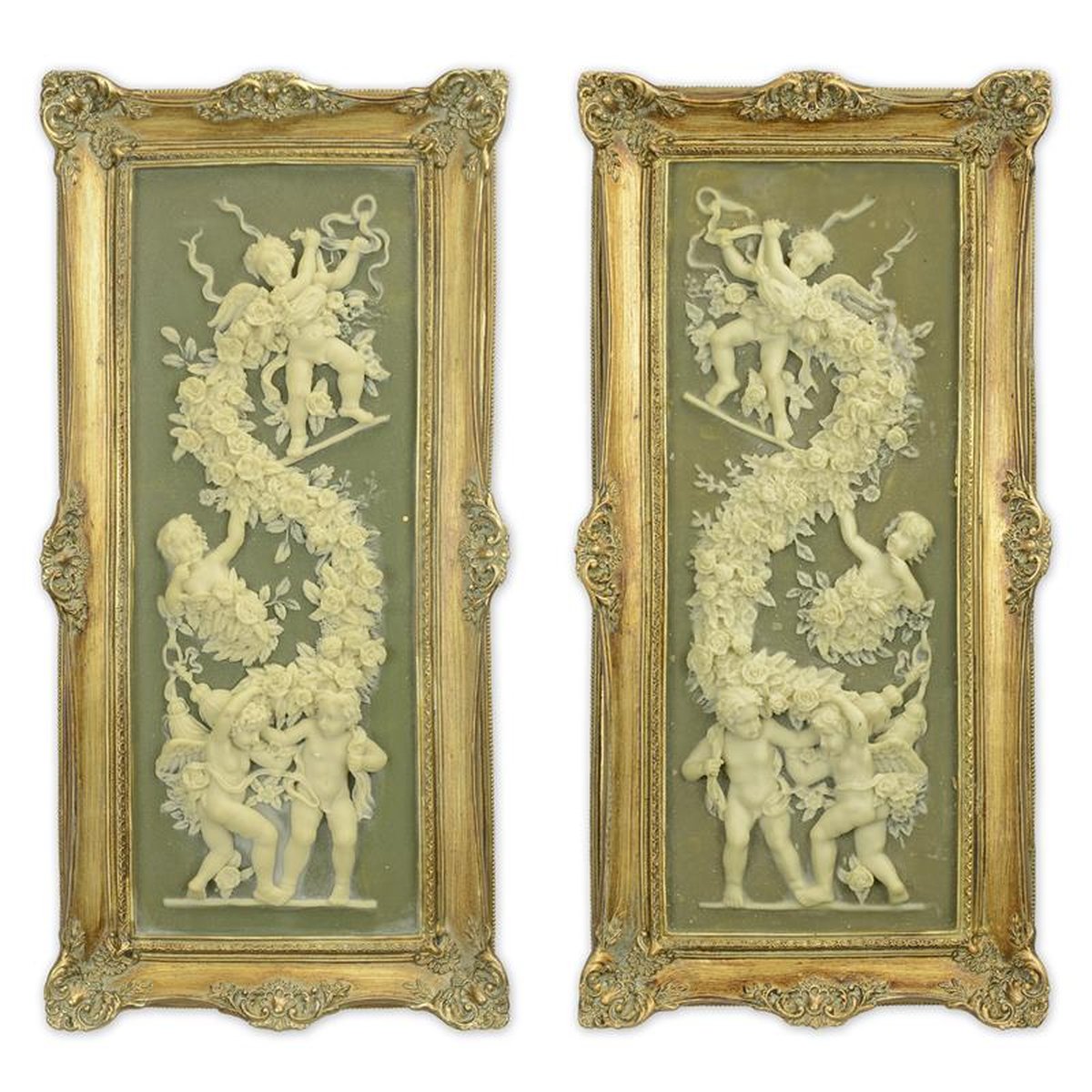 A PAIR OF FRAMED RESIN PLAQUES