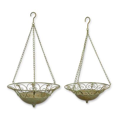 A PAIR OF HANGING IRON BASKETS