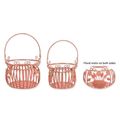 A PAIR OF IRON BASKETS - OLD ROSE
