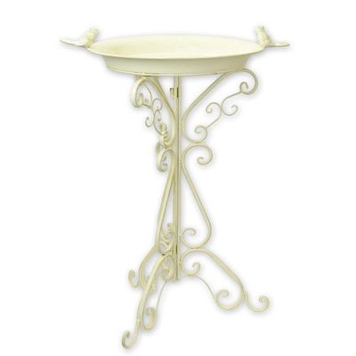 A PAIR OF IRON BIRD BATHS, OLD WHITE