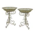 A PAIR OF IRON BIRD BATHS ON STAND