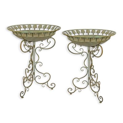 A PAIR OF IRON BIRD BATHS ON STAND