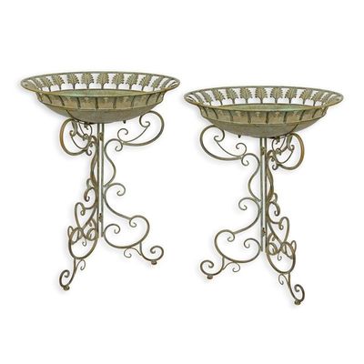 A PAIR OF IRON BIRD BATHS ON STAND
