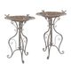 A PAIR OF IRON BIRD BATHS - WEATHERED GREY