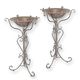 A PAIR OF IRON BIRD BATHS