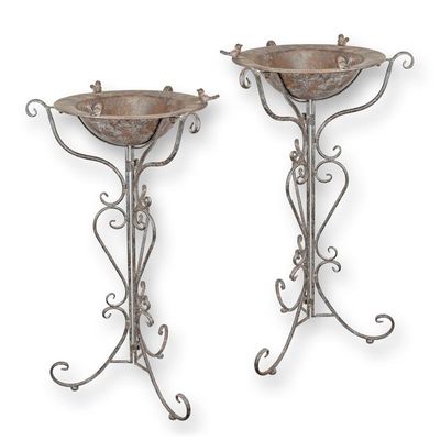 A PAIR OF IRON BIRD BATHS