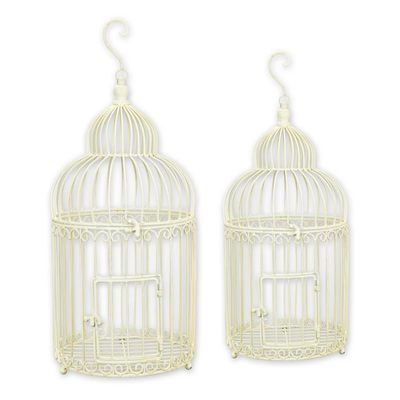 A PAIR OF IRON BIRDCAGES - WHITE