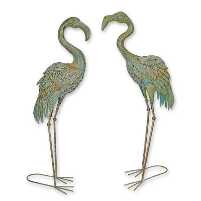 A PAIR OF IRON FLAMINGO'S