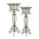 A PAIR OF IRON PLANTERS ON STAND
