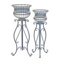 A PAIR OF IRON PLANTERS ON STAND