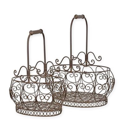 A PAIR OF IRON WIRE BASKETS - OVAL