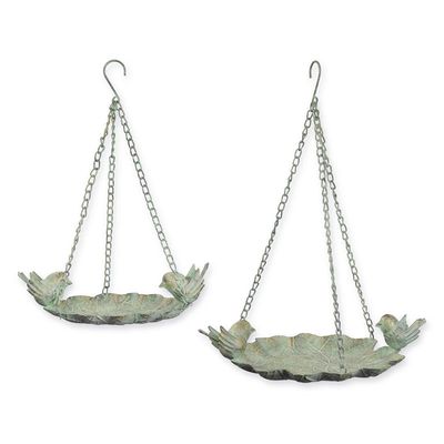 A PAIR OF LEAF SHAPED HANGING IRON BIRD BATHS