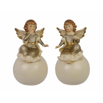 A PAIR OF PORCELAIN ANGELS ON BALL