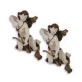 A PAIR OF RESIN PUTTI WITH BOW AND ARROW