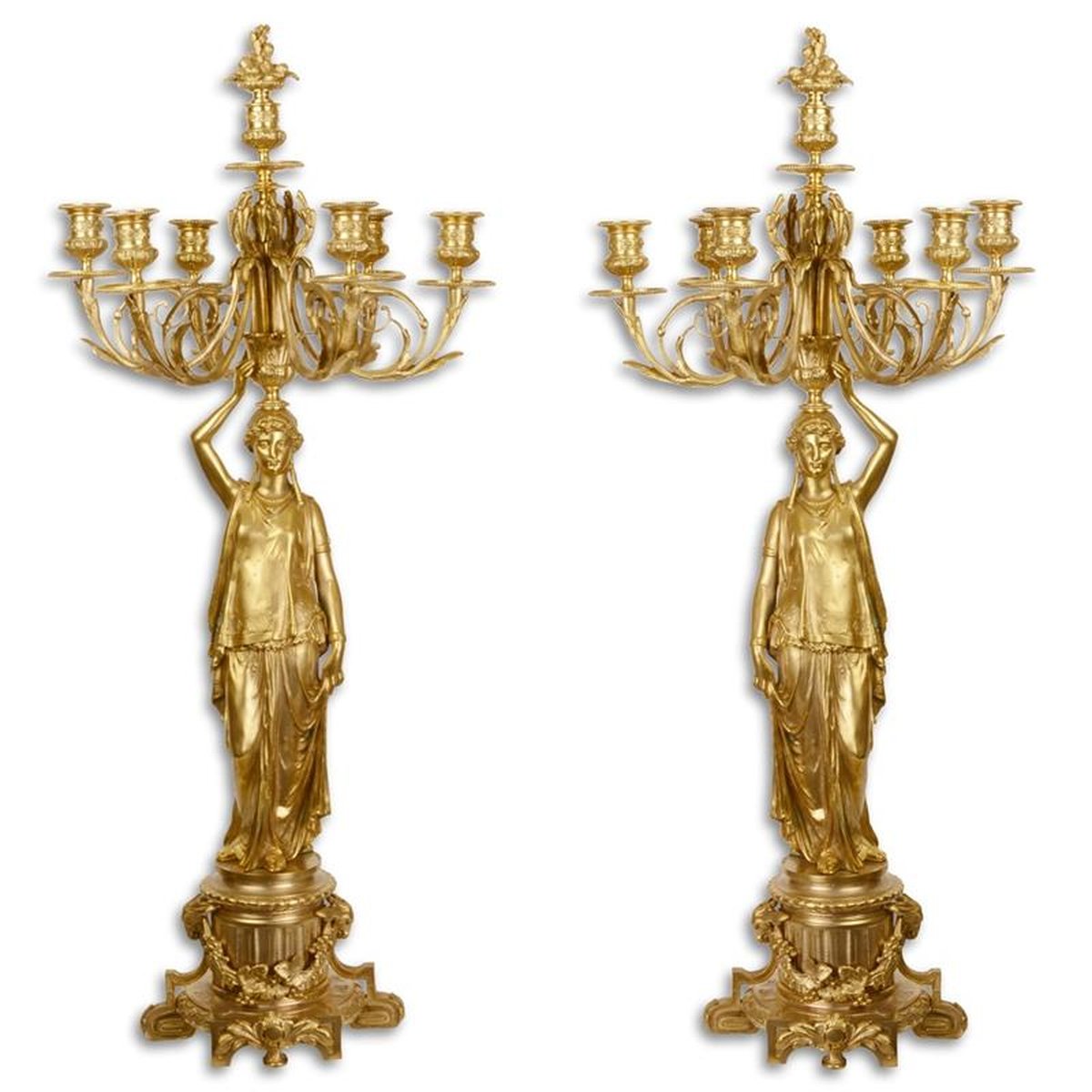 A PAIR OF SEVEN LIGHT GILT BRONZE CANDELABRA