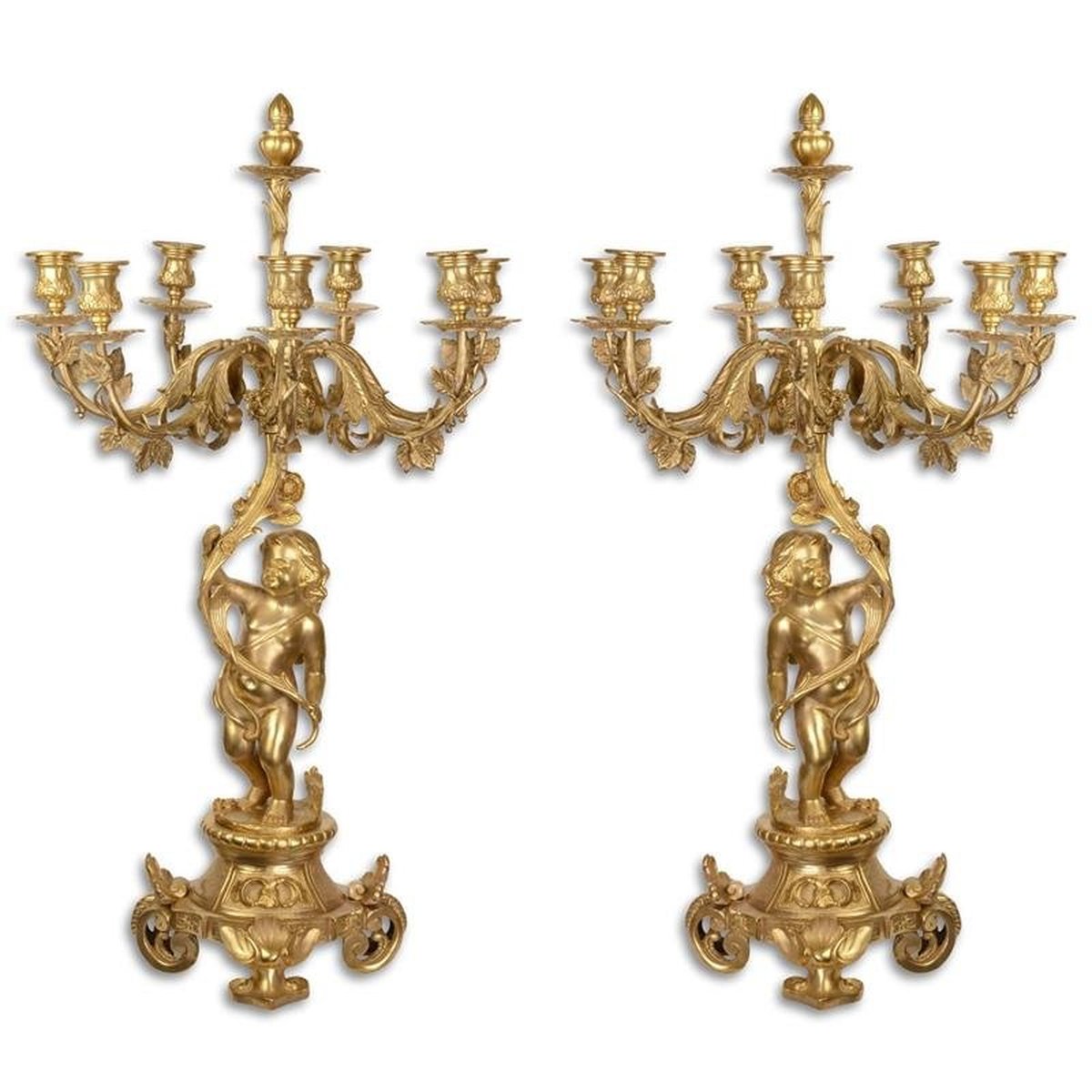 A Pair of Seven Light Gilt Candelabra
