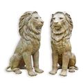 A PAIR OF SITTING BRONZE LIONS
