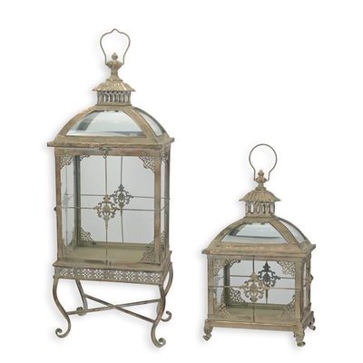 A PAIR OF TIN CANDLE HOLDERS