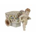 A PORCELAIN CHERUB CART